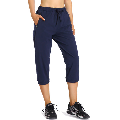 Image of Womens Lightweight Jogger Capri Pants Quick Dry Workout Running Capris Sun Protection UPF 50+ Zipper Pockets